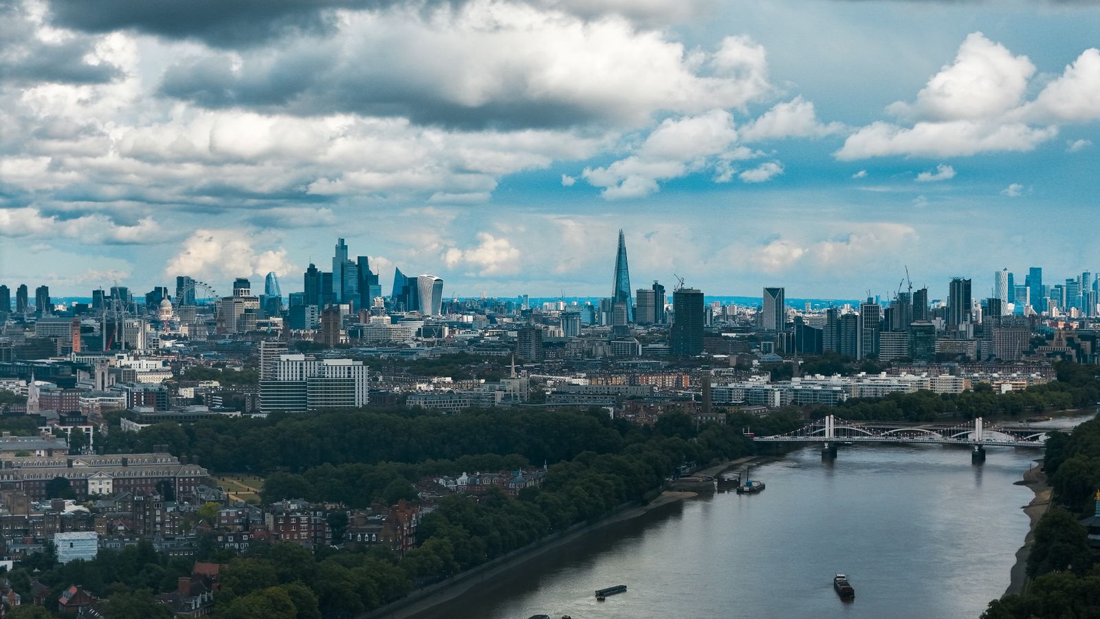 The London skyline and the River Thames under a dramatic sky