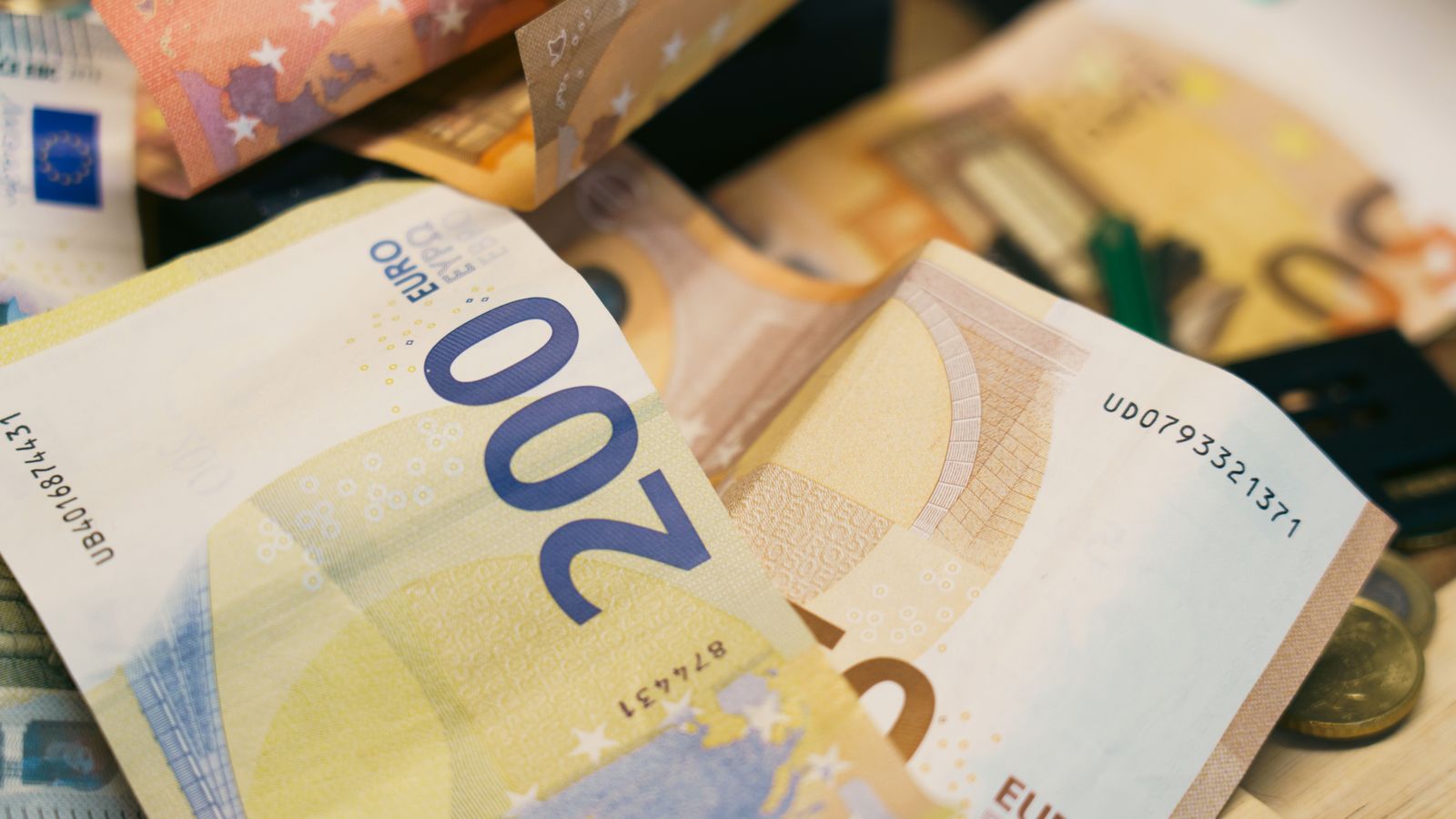 Assorted euro banknotes laid out close up
